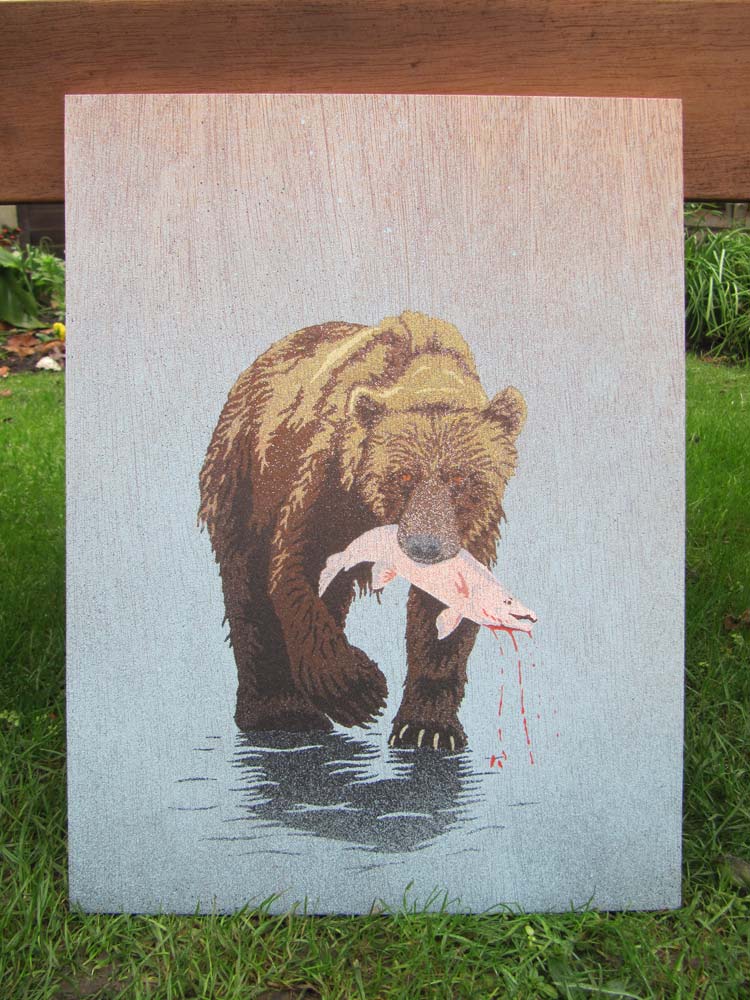 Bear catching salmon